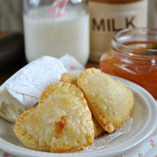 Brie & Jam Hand Pies from www.somethingswan... | I'm newly obsessed with Brie Cheese as a dessert, and this is ridiculously easy to make a delicious! #brie #pie #recipe