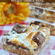 Nutter Butter S'mores Magic Bars on www.somethingswanky.com #recipes #dessert