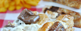Nutter Butter S'mores Magic Bars on www.somethingswanky.com #recipes #dessert