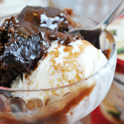 This Hot Fudge Cake is a Sunday night favorite at our house! It's the hot fudge and the cake all prepared and baked in the same dish, and it comes out all ooey, gooey, and delicious. www.somethingswanky.com