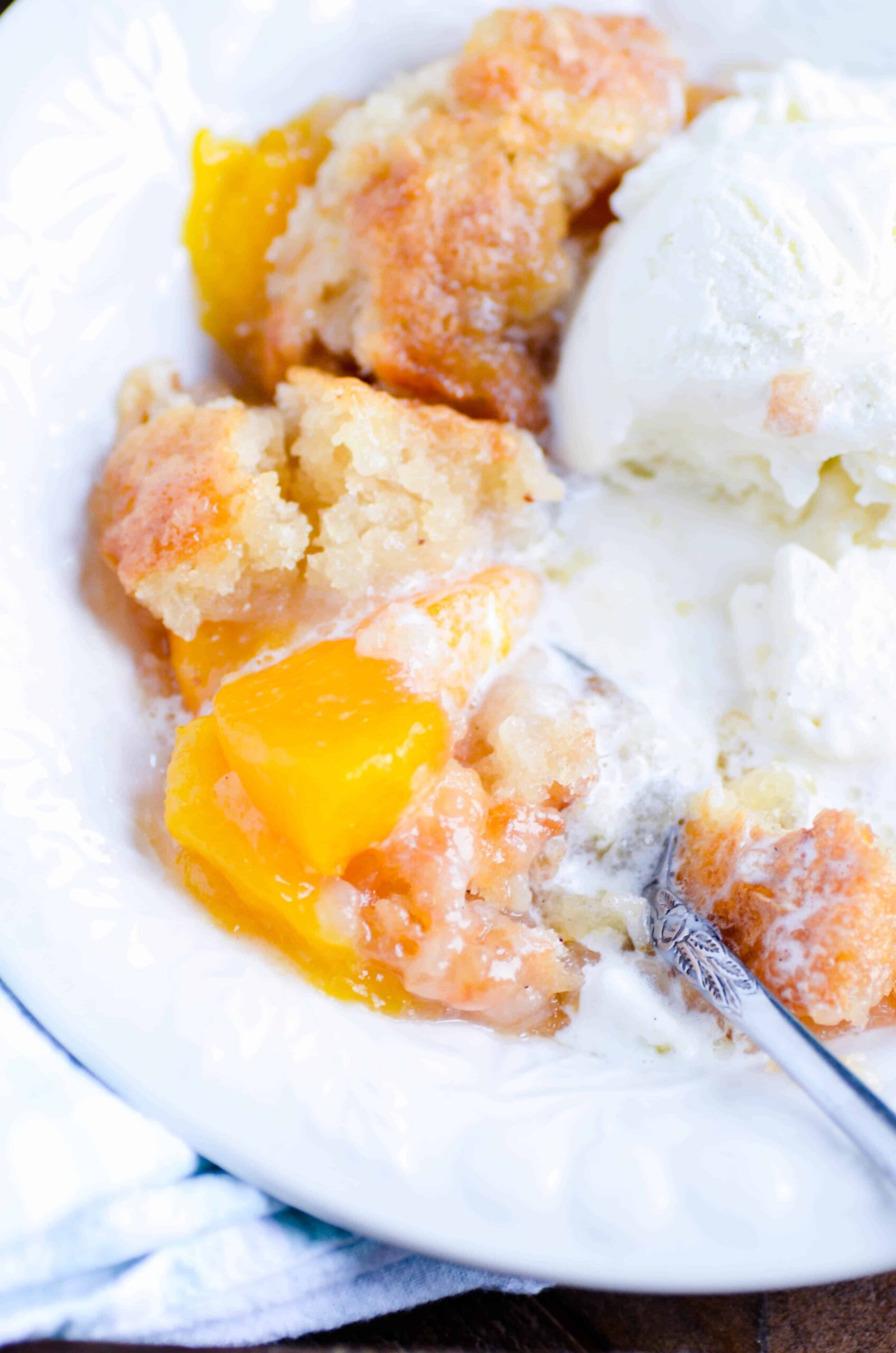 Quick and easy peach cobbler. The perfect recipe to stretch out those summer days a little bit longer!