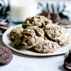 Chocolate sandwich cookies and classic chocolate chip cookies collide in these Cookies & Cream Cookies!