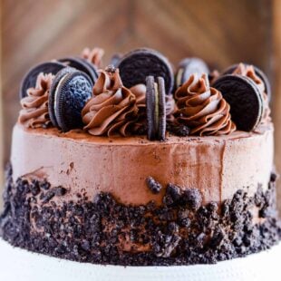 Two layers of rich, chocolate Oreo cake with a fudgy chocolate buttercream and Oreo crumbles on top.