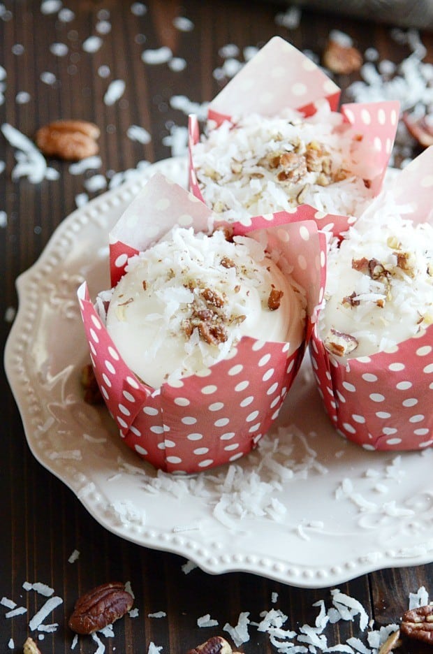 This Southern classic is banana bread and cupcake all rolled into one! A super moist banana cupcake with crushed pineapple, coconut, and pecans folded into the batter topped with an irresistibly dreamy cream cheese frosting.