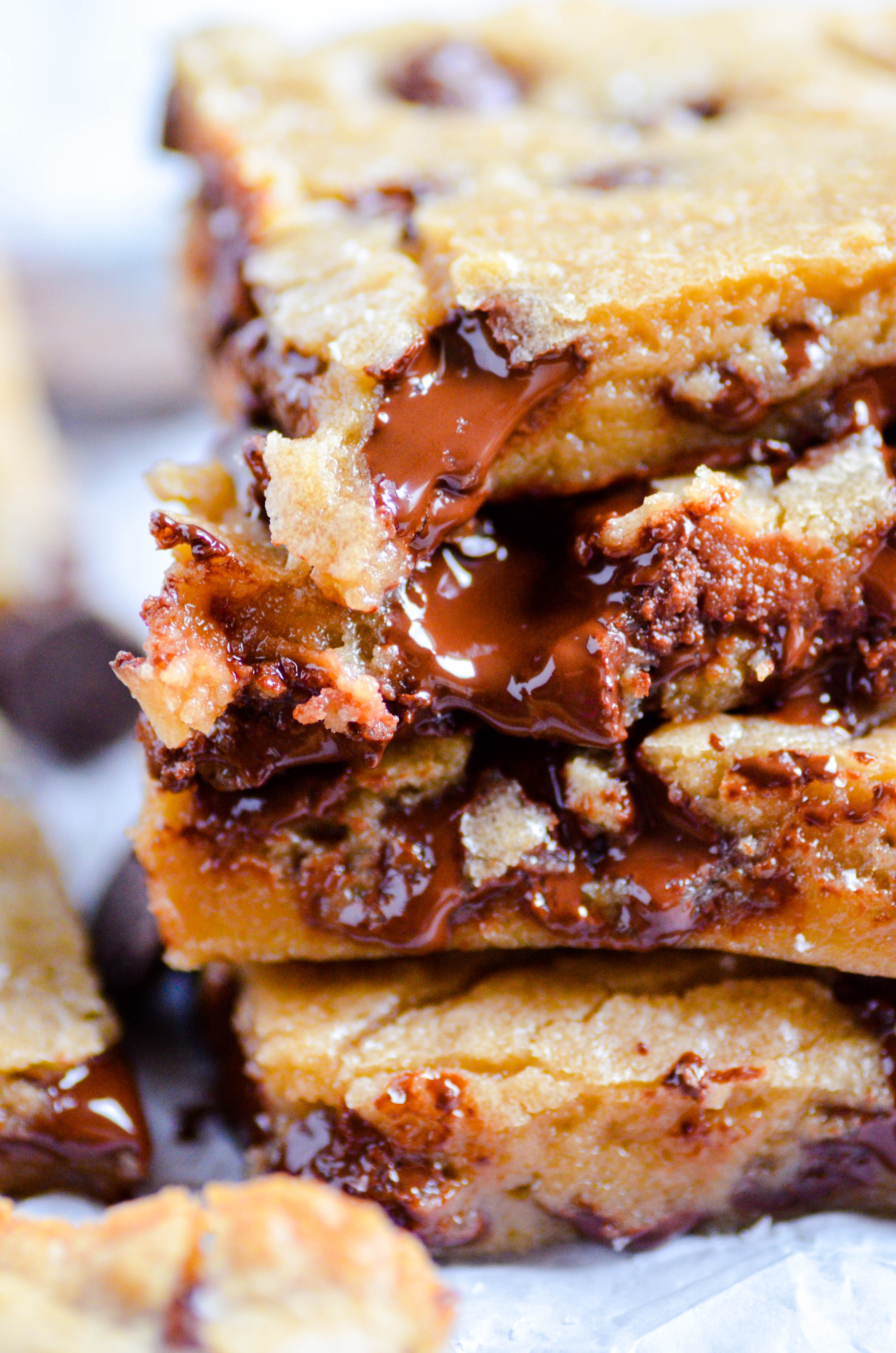 These chewy, fudgy chocolate chip blondies require no mixer and very little prep work. Their crackly golden tops and gooey centers are utter perfection!