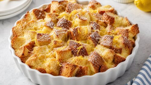 This Lemon Bread Pudding is bursting with fresh citrus flavor, topped with a dreamy lemon cream sauce. You are SO going to love this! 🍋