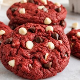These Red Velvet Monster Cookies are chewy, gooey, and loaded with M&Ms! A dreamy treat you absolutely have to make. 🍪❤️