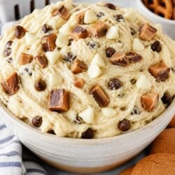 This White Chocolate Toffee Doodle Cookie Dough Dip is creamy, dreamy & ready in 10 minutes! Perfect for any party. Grab your graham crackers & dig in!