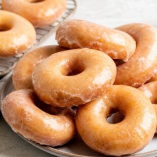 These homemade Krispy Kreme donuts are pillowy, glazed perfection! I'm showing you exactly how to make them fresh in your own kitchen. 🍩