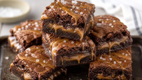 These salted caramel brownies are fudgy, gooey, and SO dreamy! Make them from scratch or with a box mix — either way, you have to try them! 🍫