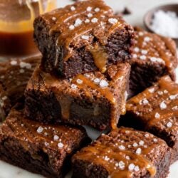 These salted caramel brownies are fudgy, gooey, and SO dreamy! Make them from scratch or with a box mix — either way, you have to try them! 🍫