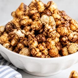 This Caramel Caribou Popcorn is a dreamy, crunchy copycat treat loaded with caramel, cashews & chocolate. You HAVE to make this!