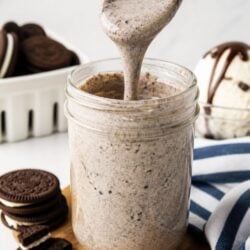 This Cookies & Cream Sundae Sauce is creamy, gooey & SO easy to make! Drizzle it over ice cream for the ultimate indulgent treat. 🍦