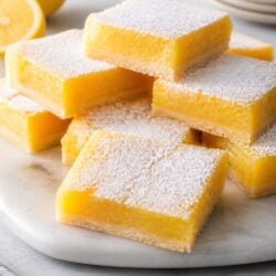 Barefoot Contessa lemon bars are buttery, creamy, and SO dreamy! Ina Garten's classic recipe is simple, foolproof, and absolutely delicious. 🍋