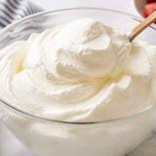 Ditch the store-bought tub! This homemade Cool Whip recipe is fluffy, creamy & SO easy to make. Your desserts will never be the same! 🍰