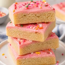 These Lofthouse Sugar Cookie Bars are soft, dreamy, and piled with fluffy frosting! So easy and absolutely delicious. You have to make these!