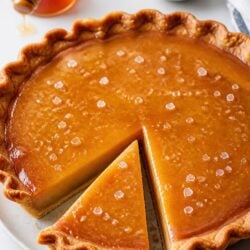 This salted honey pie is the dreamy, creamy custard pie you NEED this holiday season! Flaky crust, honey filling & flaky sea salt finish. 🍯