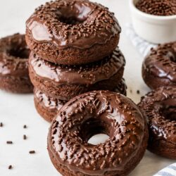 Devil's Food Cake Baked Donuts are rich, fudgy, and SO easy to make! Baked (not fried!) and dunked in a dreamy vanilla glaze. Ah-mazing!