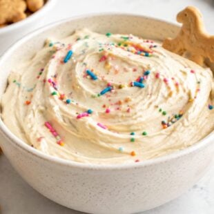 This creamy cake batter dip for animal crackers is a fun, no-bake dessert dip that's ready in 5 minutes! Perfect for parties & snack time.