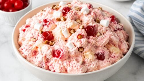 Cherry fluff salad recipe with cream cheese, marshmallows & cherry pie filling — light, fluffy, and perfect for potlucks or Sunday dinner!