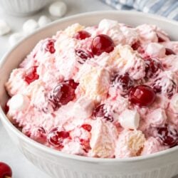 Cherry fluff salad recipe with cream cheese, marshmallows & cherry pie filling — light, fluffy, and perfect for potlucks or Sunday dinner!