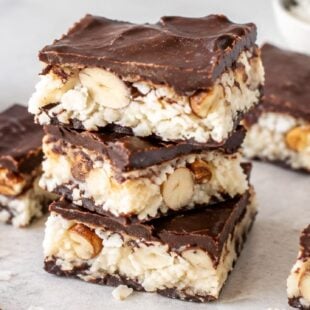 Homemade almond joy bars are SO much better than store-bought! Coconut, almonds & chocolate — simple, dreamy & totally irresistible. 🍫