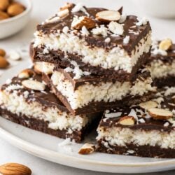 Homemade almond joy bars are SO much better than store-bought! Coconut, almonds & chocolate — simple, dreamy & totally irresistible. 🍫