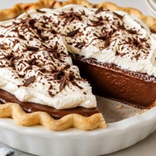 This old fashioned fudge pie recipe is fudgy, chocolatey, and so easy to make! Grab a fork—you have to try this decadent dessert ASAP!