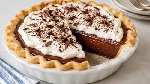 This old fashioned fudge pie recipe is fudgy, chocolatey, and so easy to make! Grab a fork—you have to try this decadent dessert ASAP!
