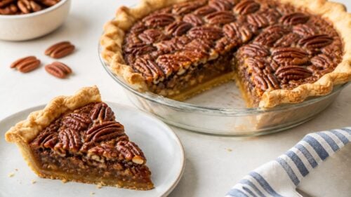 Easy mini pecan pie recipe using store-bought crust! Gooey, buttery filling in cute individual pies—perfect for Thanksgiving dessert. 🥧