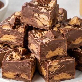 This Reese's fudge recipe is creamy, dreamy, and so easy! Just a few simple ingredients for the ultimate peanut butter chocolate treat.