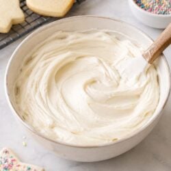 This easy sugar cookie icing recipe dries glossy and hard, holds vibrant color, and makes decorating cookies totally fool proof every time!